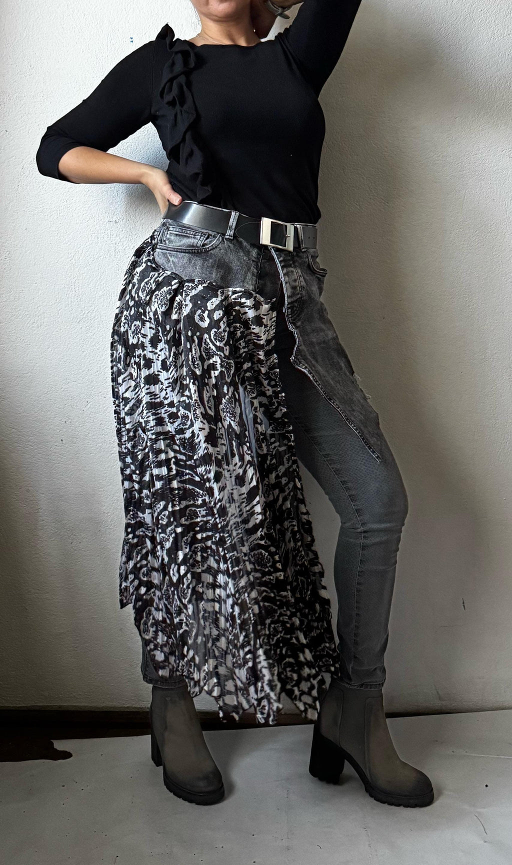 Skirt over jeans, recycled materials, contemporary design