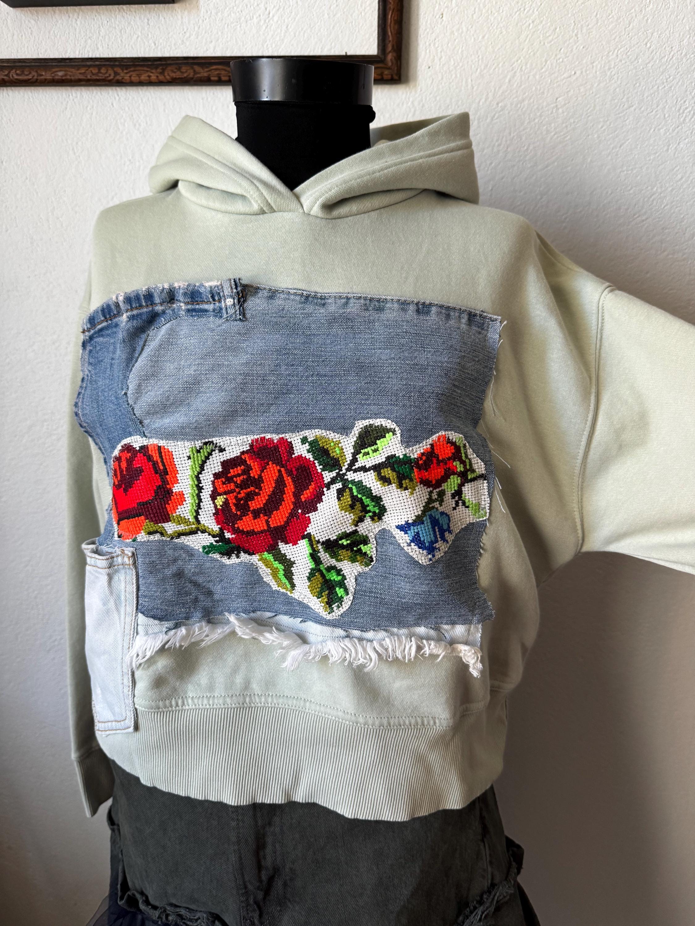Hoodie with traditional embroidery and recycled vintage jeans patchwork