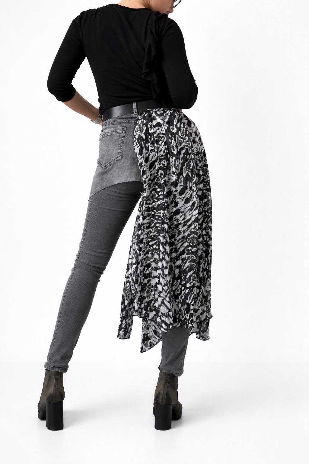 Skirt over jeans, recycled materials, contemporary design