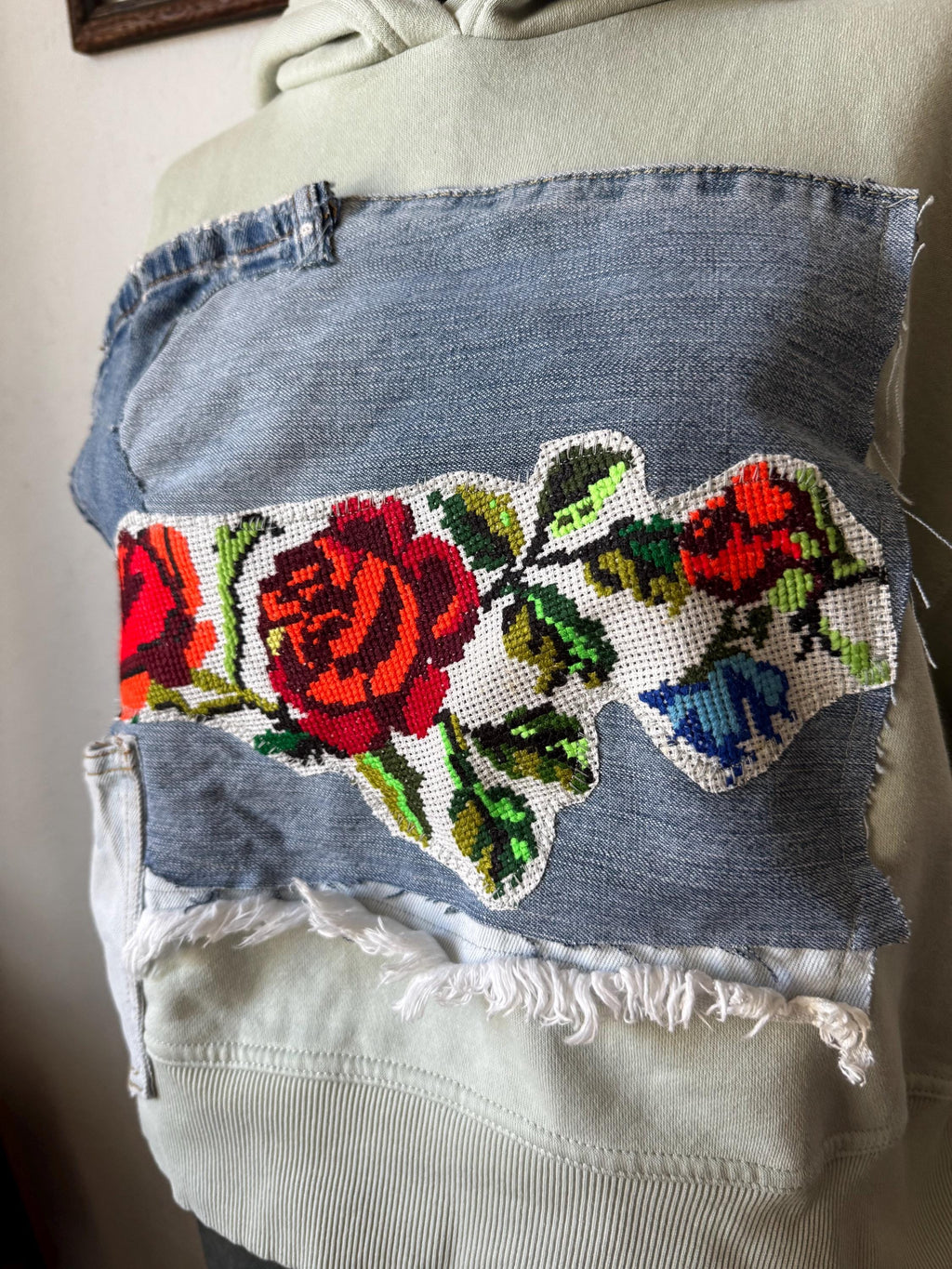 Hoodie with traditional embroidery and recycled vintage jeans patchwork