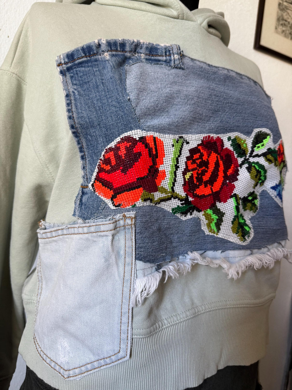 Hoodie with traditional embroidery and recycled vintage jeans patchwork