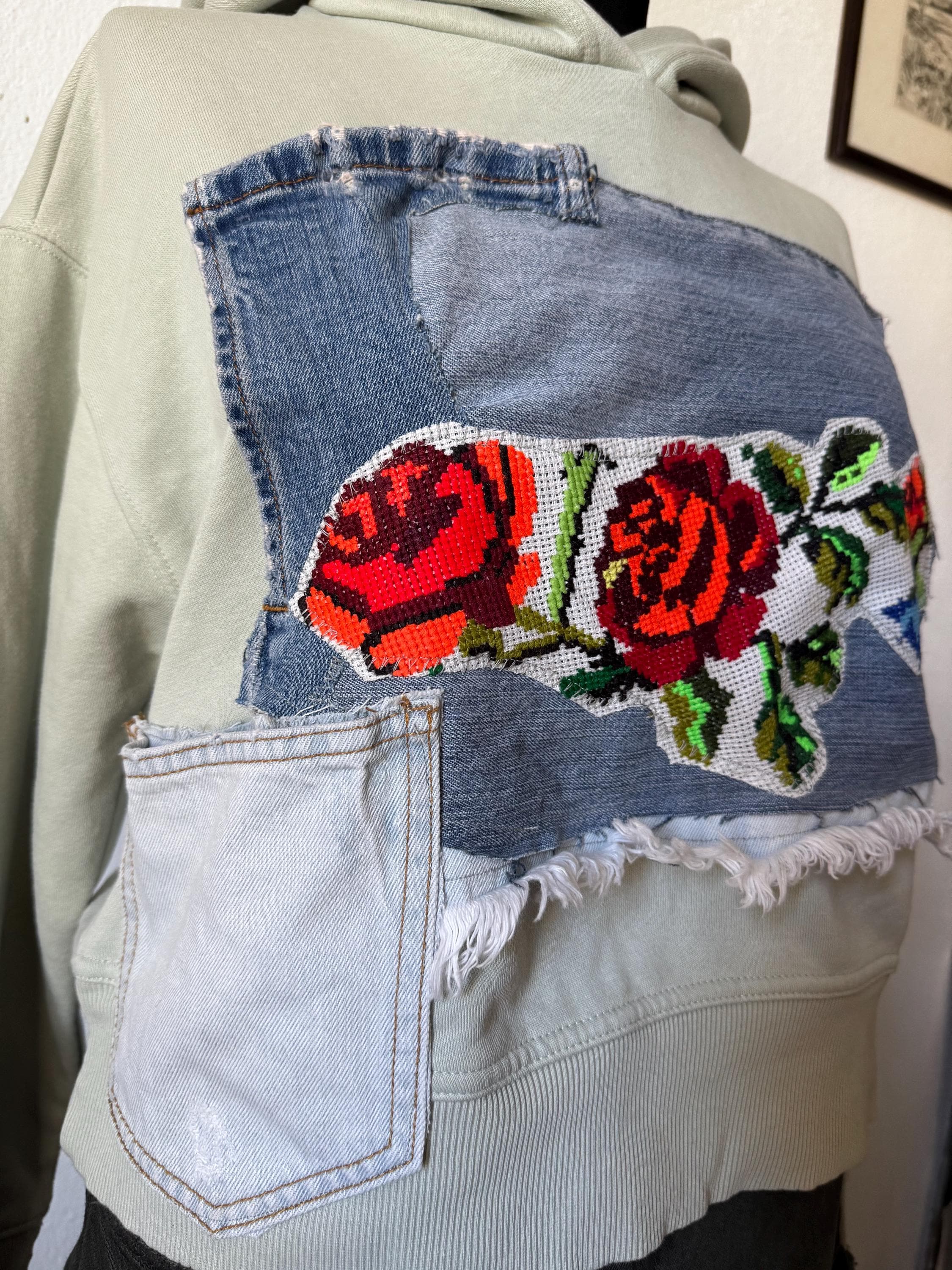 Hoodie with traditional embroidery and recycled vintage jeans patchwork