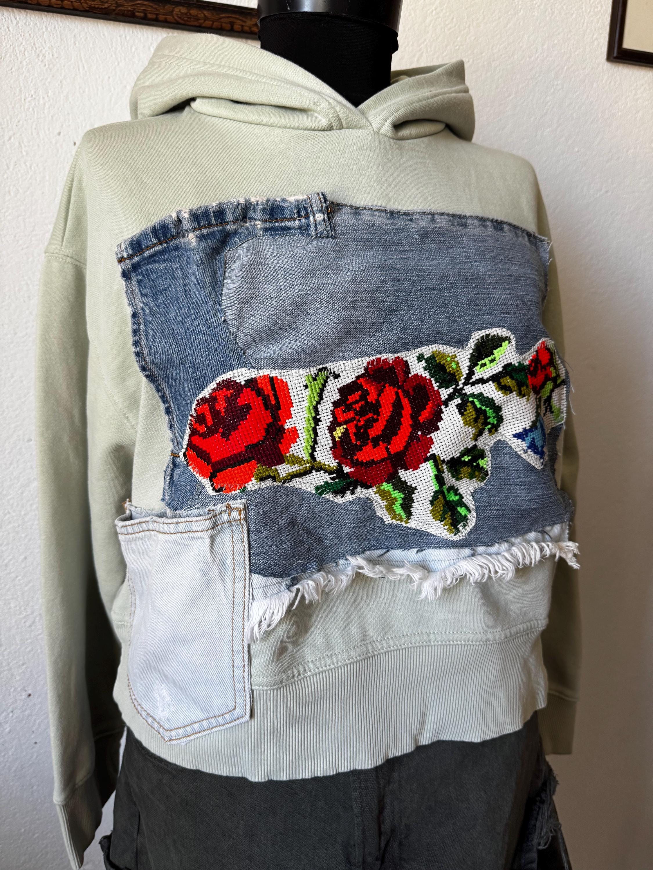 Hoodie with traditional embroidery and recycled vintage jeans patchwork