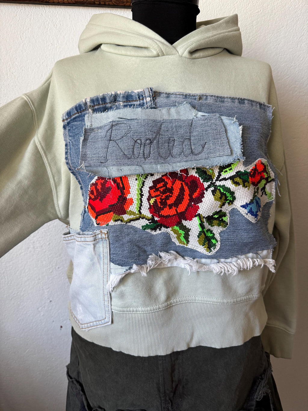 Hoodie with traditional embroidery and recycled vintage jeans patchwork