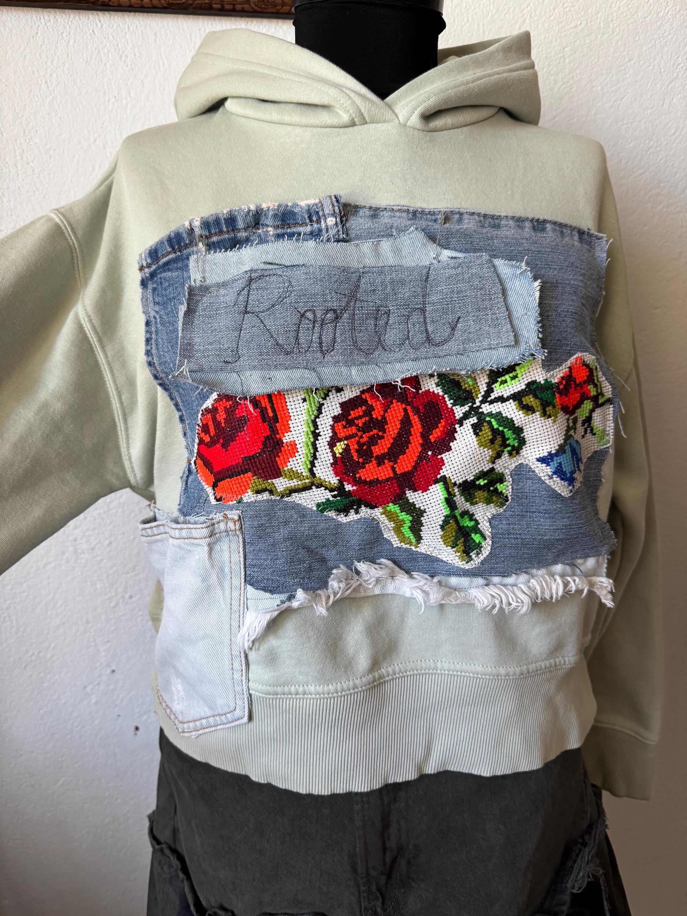 Hoodie with traditional embroidery and recycled vintage jeans patchwork