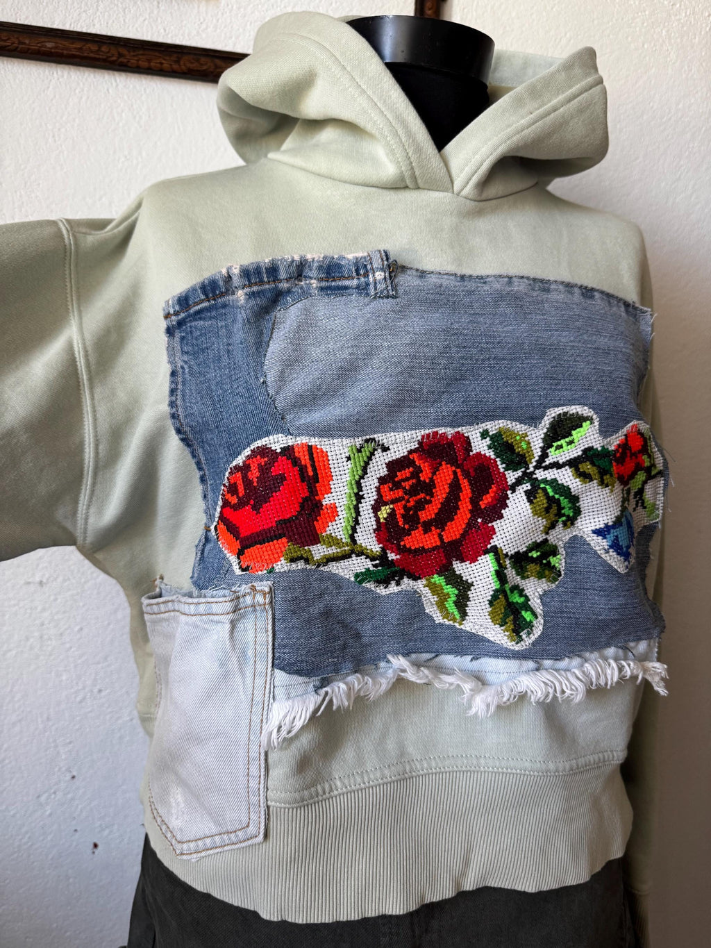 Hoodie with traditional embroidery and recycled vintage jeans patchwork