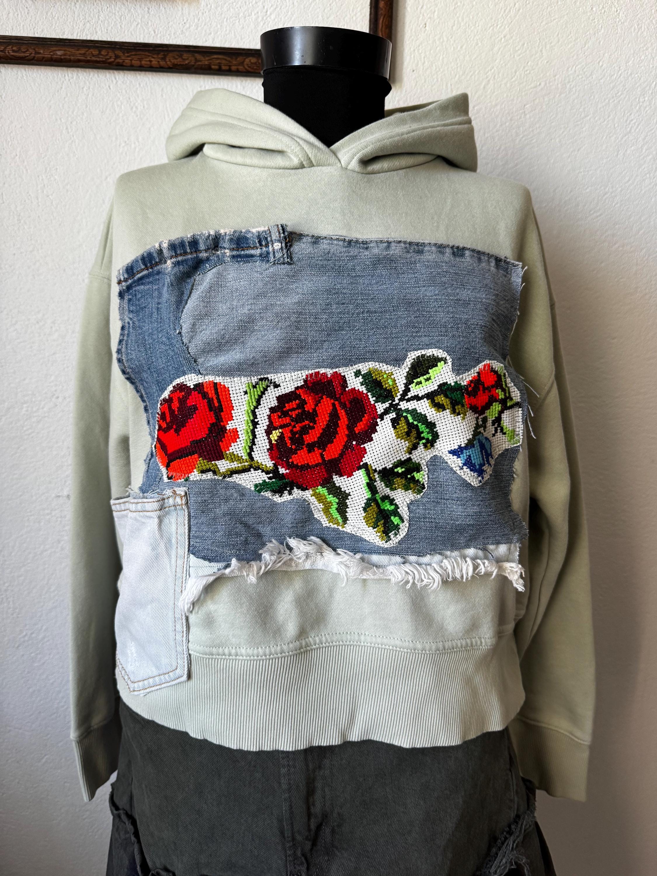 Hoodie with traditional embroidery and recycled vintage jeans patchwork