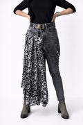 Skirt over jeans, recycled materials, contemporary design
